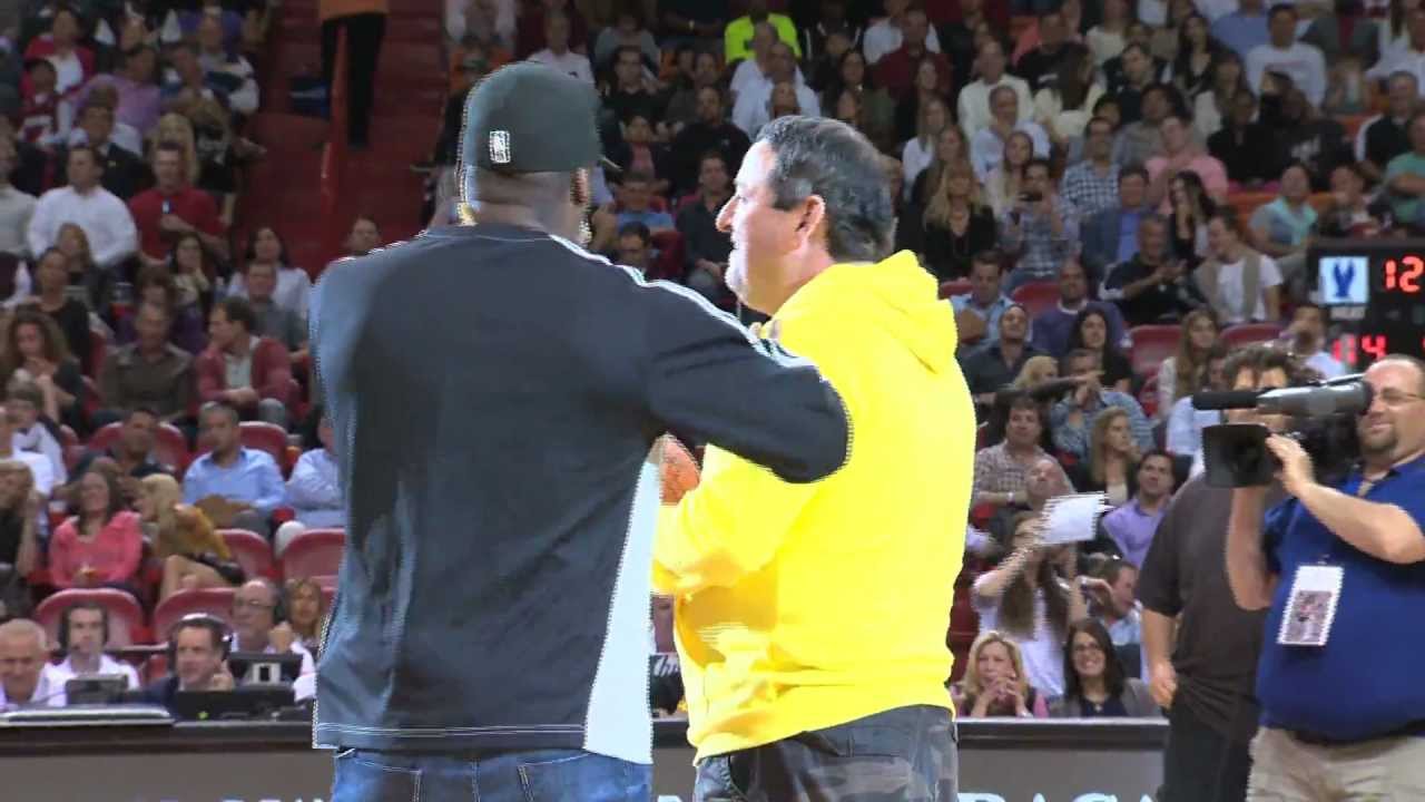 Heat fan sinks half court shot for $75,000! Hugged by LeBron. Pistons at Heat 1/25/2013