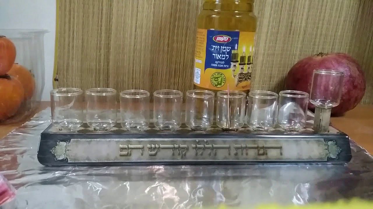 How to light an oil Chanukiah (long version), and how to say the Chanukah blessings.