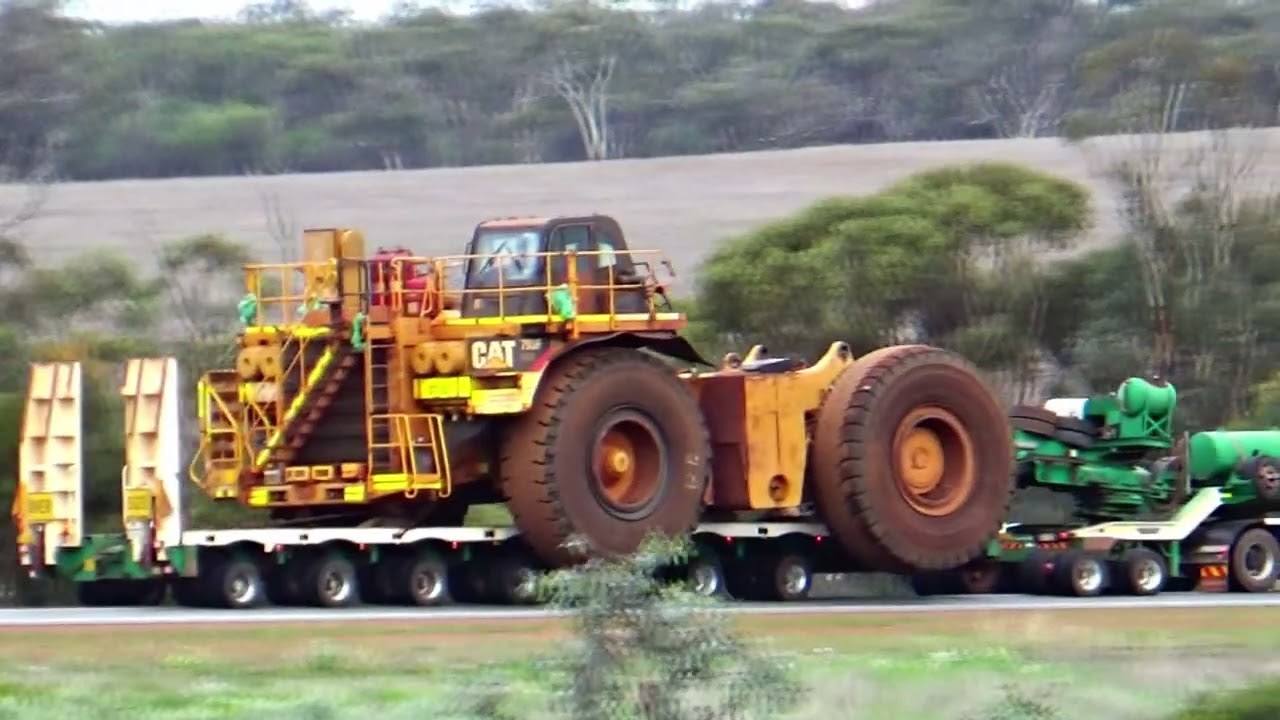 🚛. Doolan's Heavy Haulage southbound, with used CAT 793F  dump truck, at New Norcia & Bindoon Hill.
