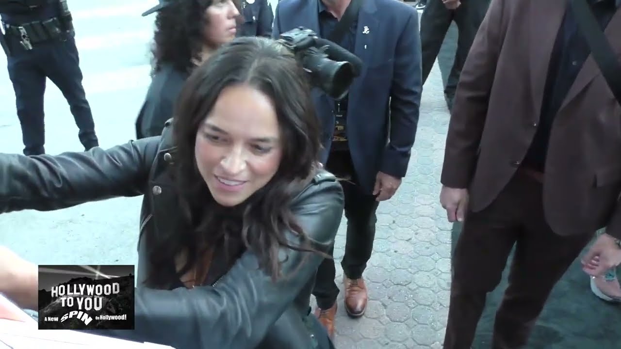 Michelle Rodriguez greets fans at the Fast And The Furious 25th Anniversary Event at Village Theatre