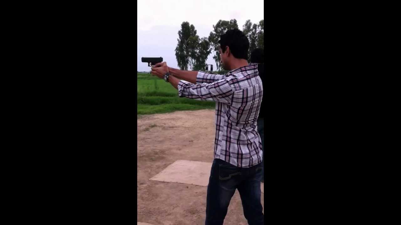 Amir shooting Glock 19 at Mahfooz Shaheed Garrison, Lahore on August 22, 2012