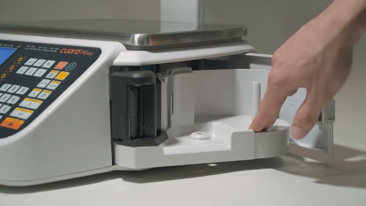 Cambio de papel térmico  en CUORA MAX ST