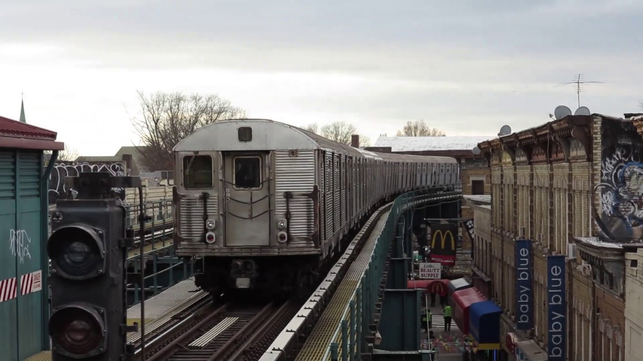 R32 J train Leaving Woodhaven Blvd
