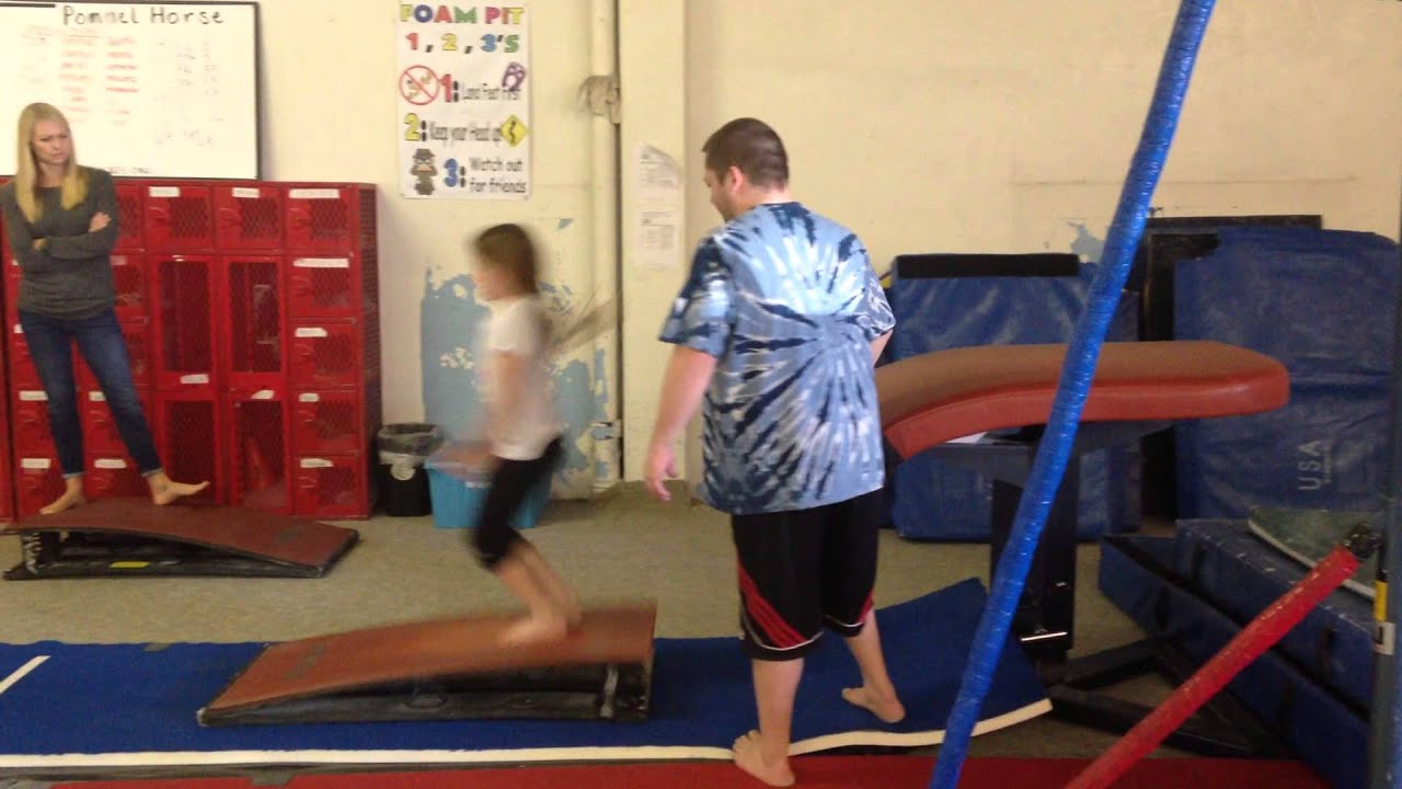 Vault spotting: Squat ons on the table