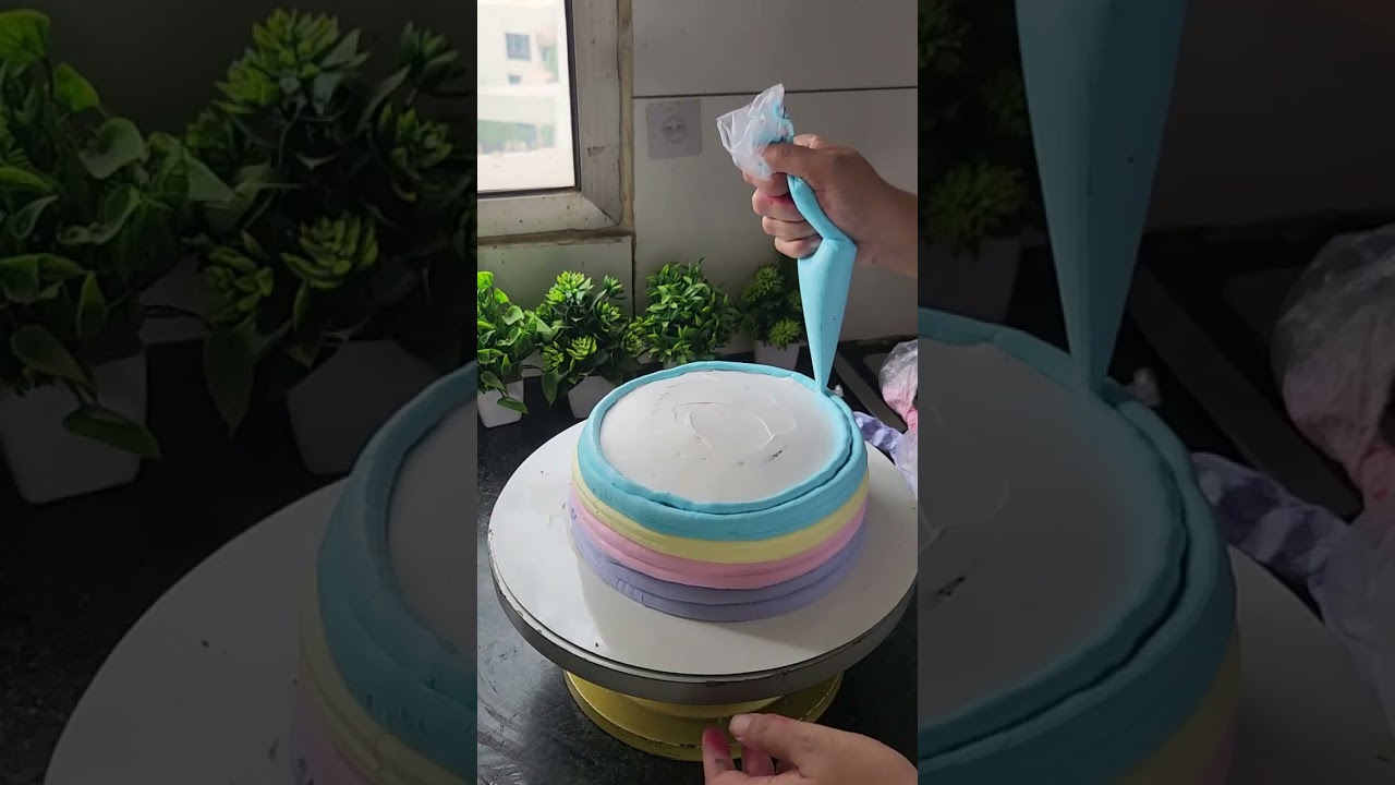 Rainbow unicorn tier cake