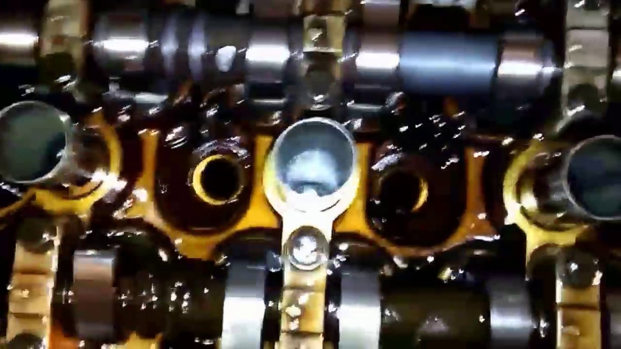 Cam cap bolts fixed. Valve cover painted