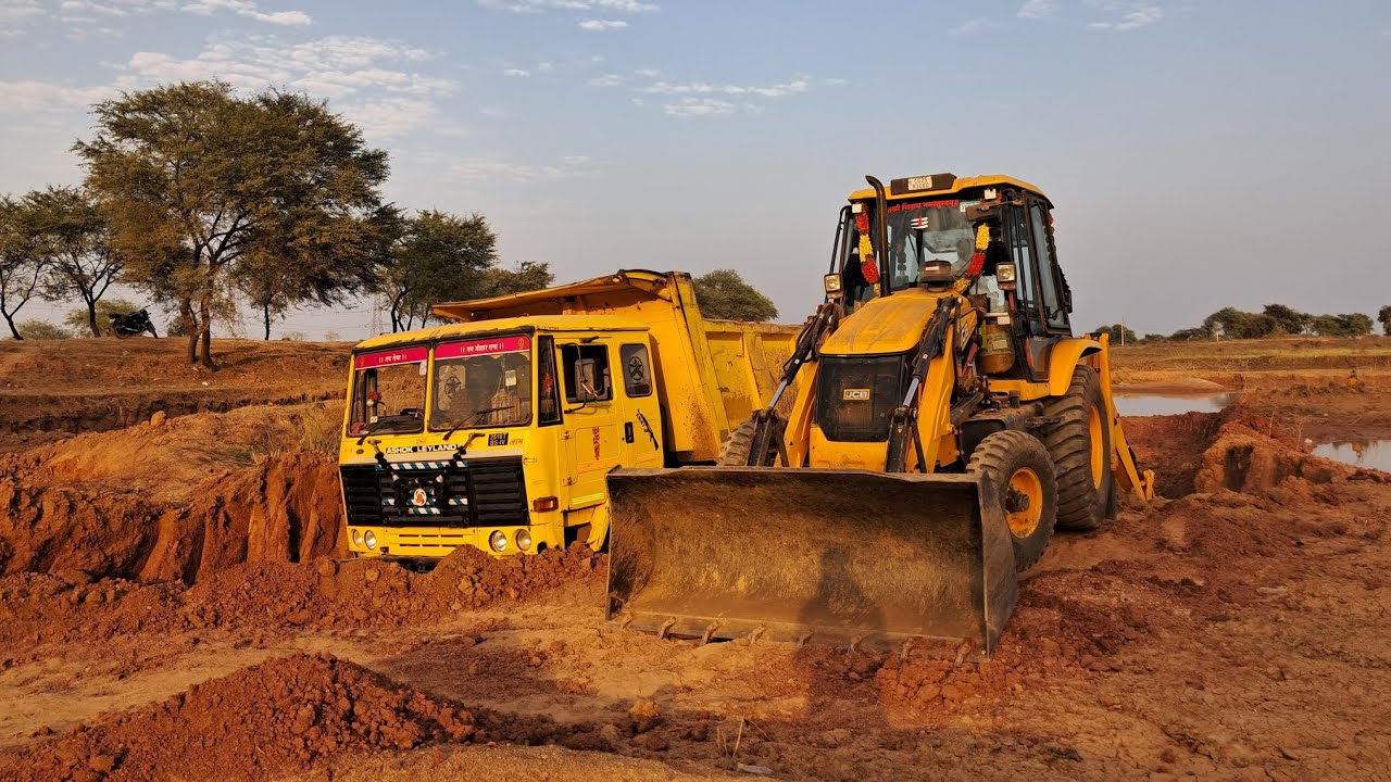 Jcb 3dx Machin loding mud in Ashok Leyland 3180 truck 