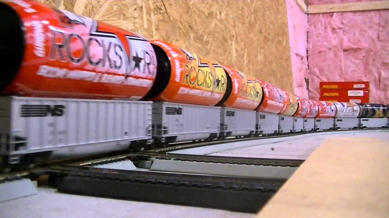 Very long train with empty rockstar cans