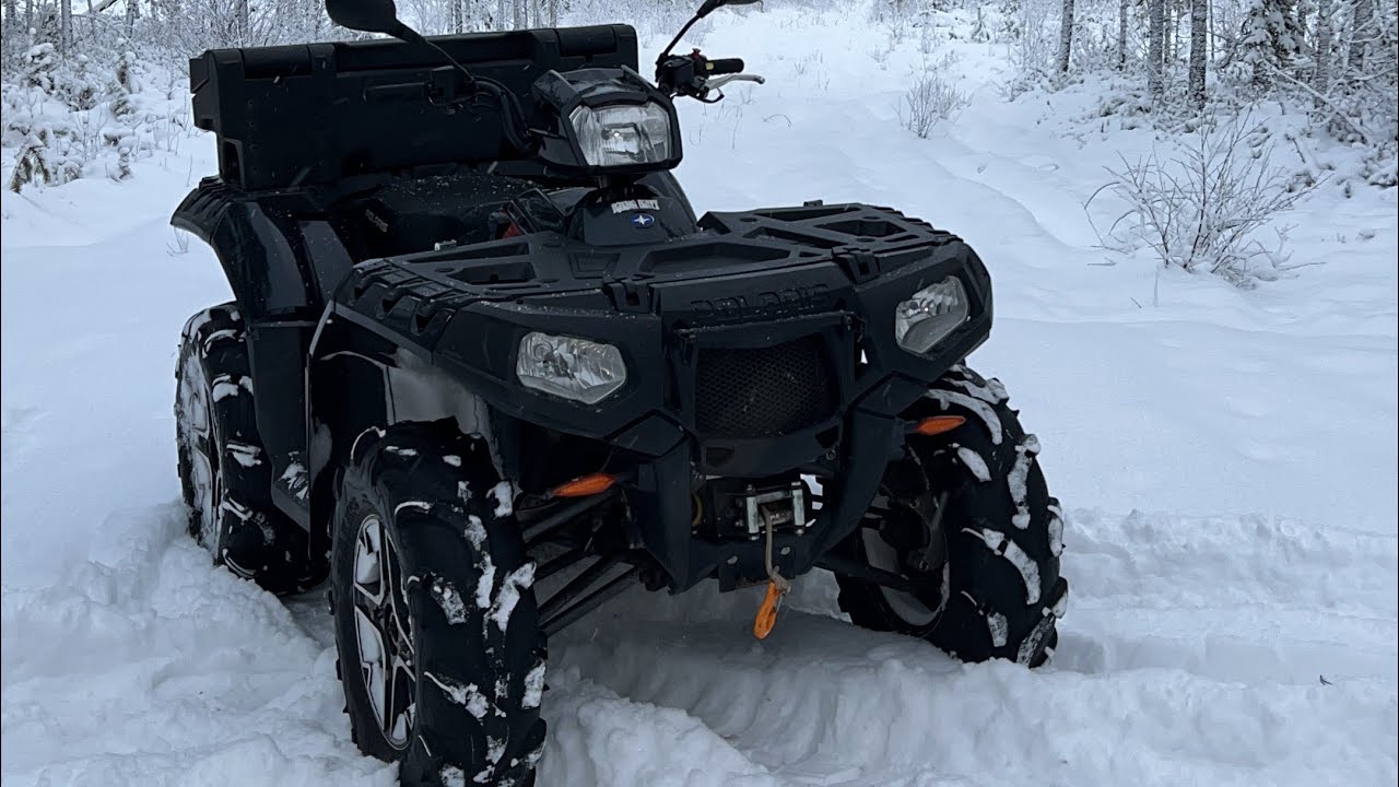 Polaris Sportsman 1000 XP snow ride