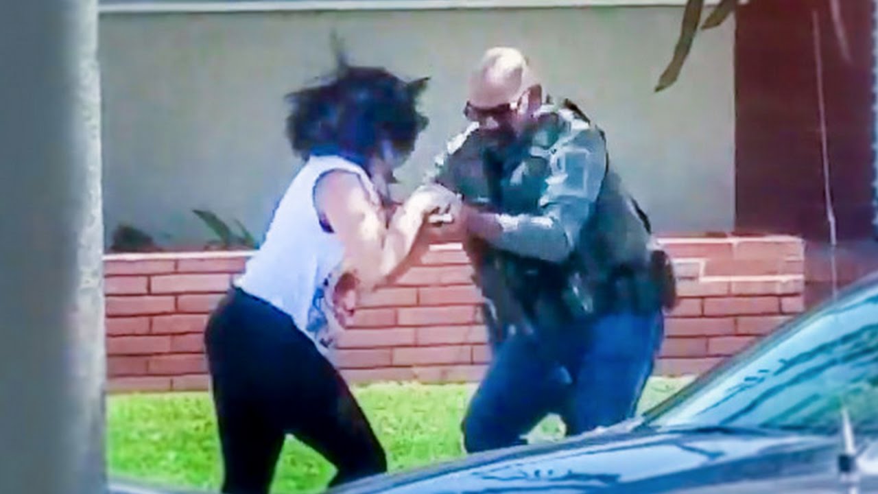 Woman Recording Cop Activity Gets Cell Phone Aggressively Taken And Destroyed