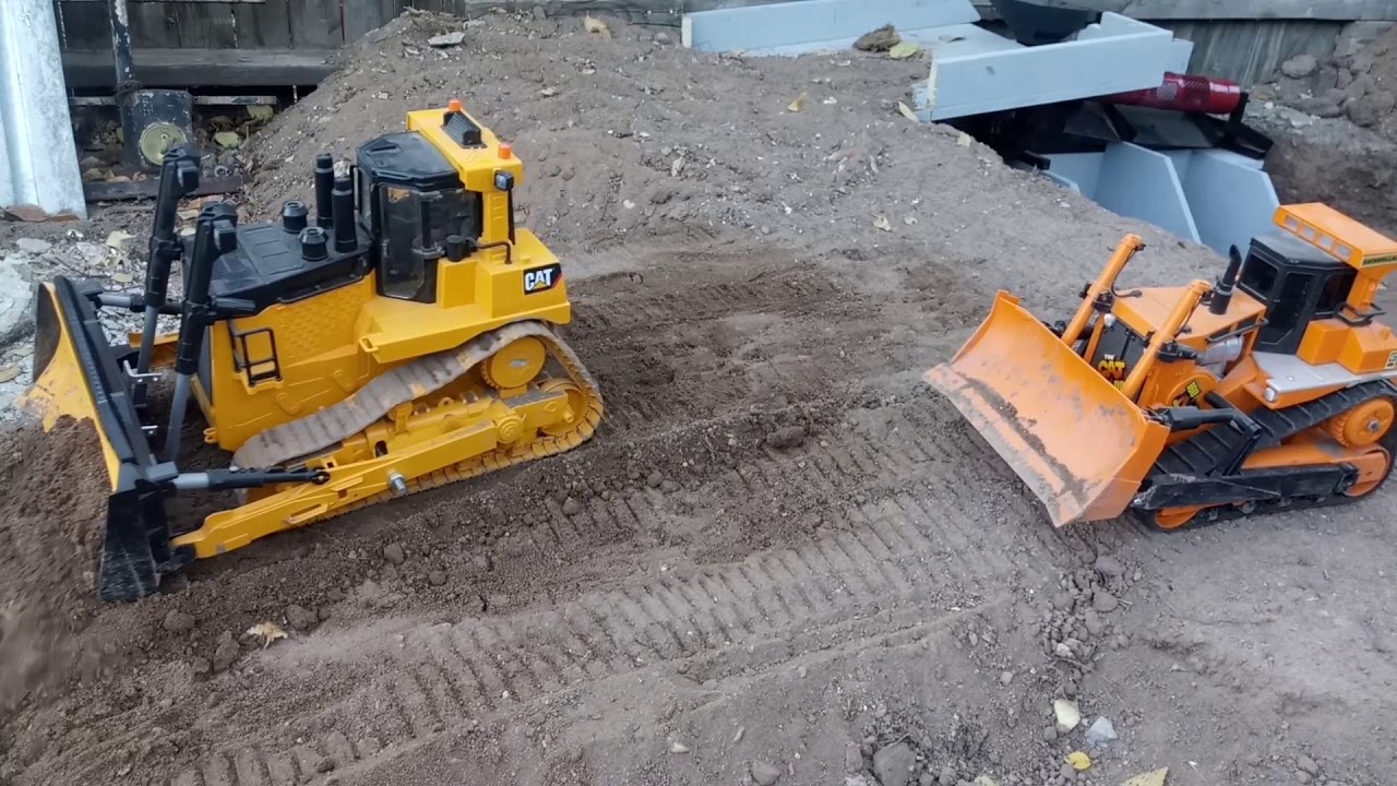 Bruder D11 and D9 Dozers Working Trommel Site