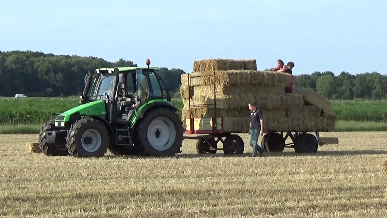 FORD 7610 MET EEN CLAAS MARKANT 65 STRO PERSEN
