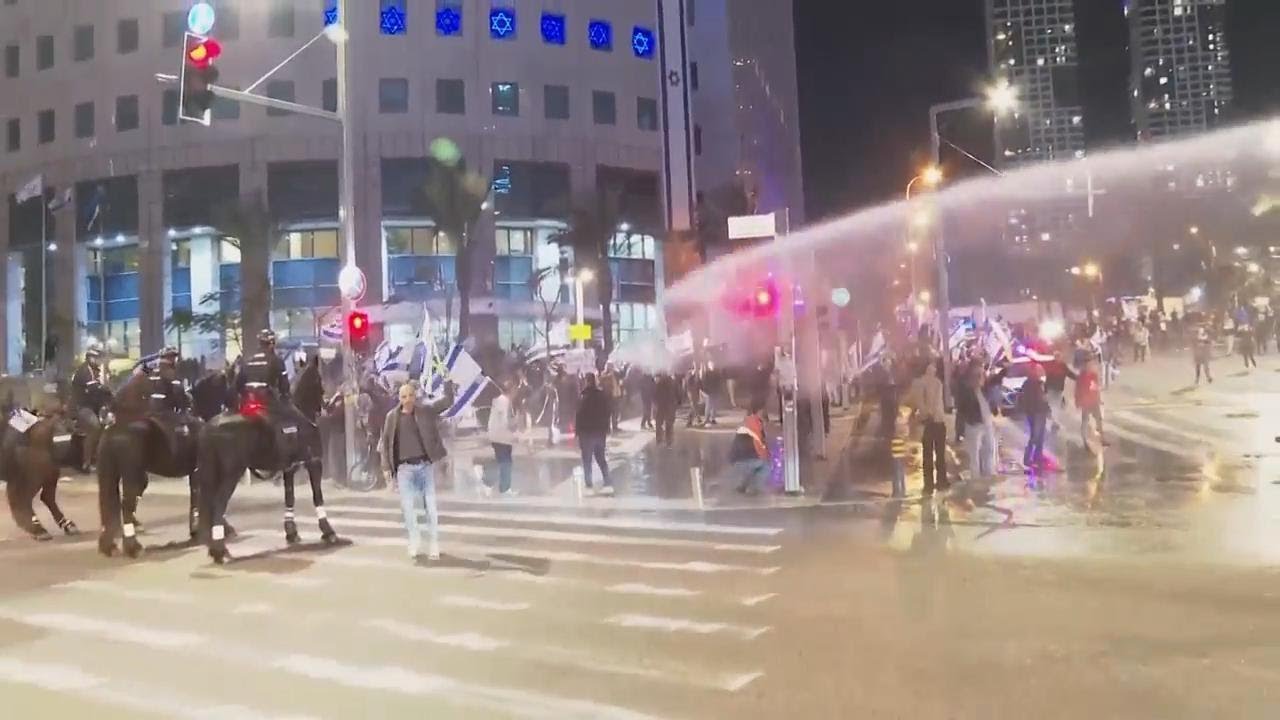 Police use water cannon to disperse anti-government protesters in Tel Aviv