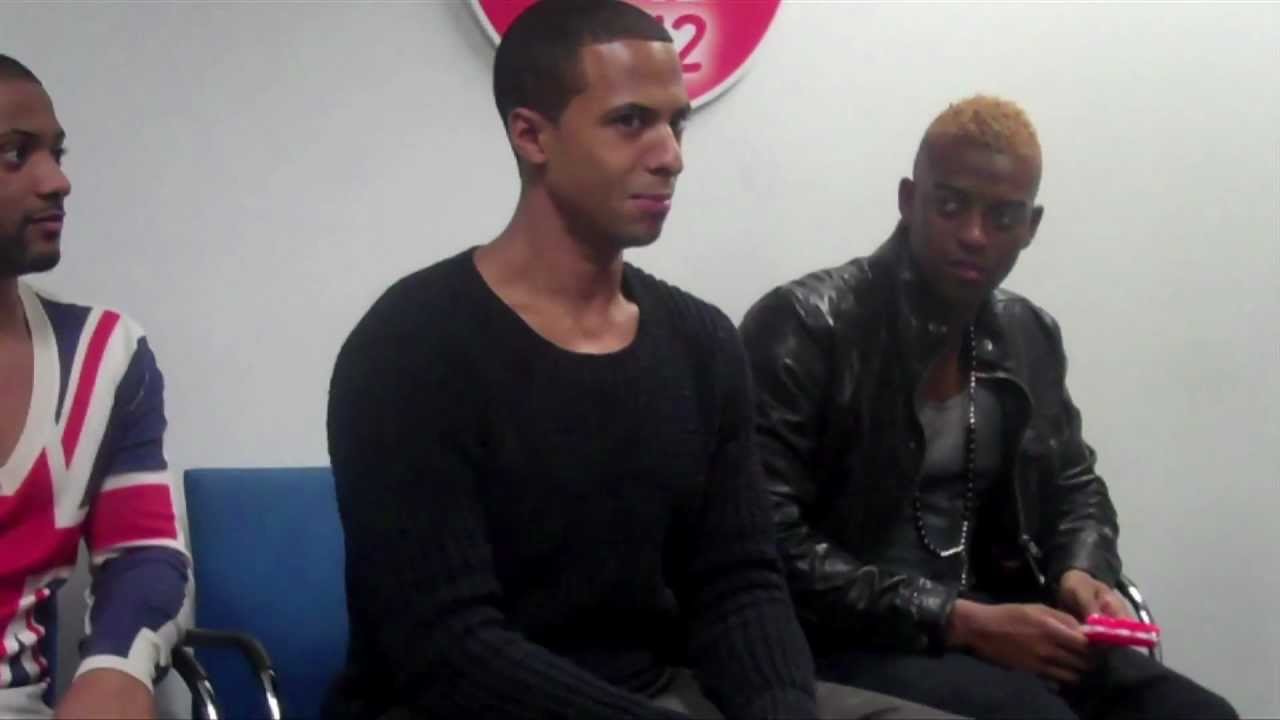 JLS wheelbarrow racing, handstand press ups & singing