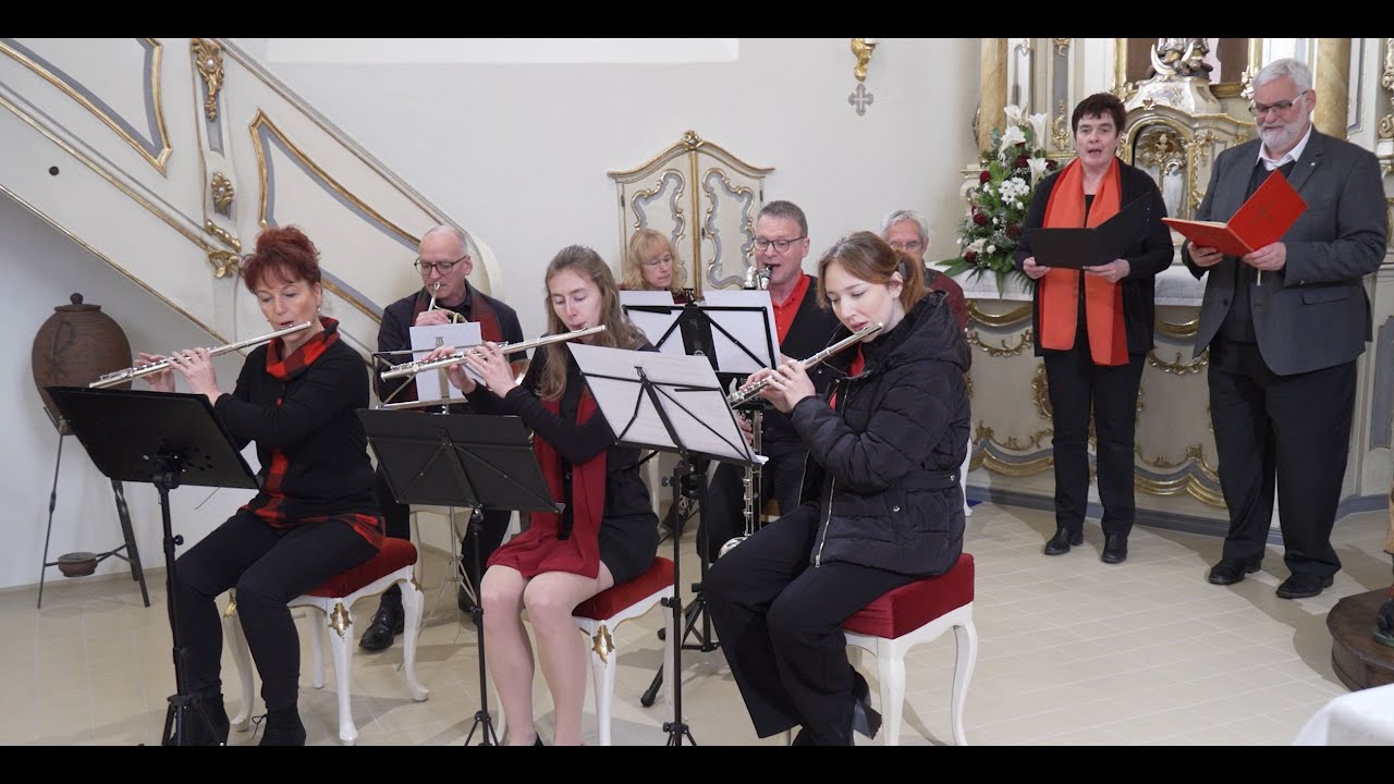 co-message: „Pastor Comes singt mit der Musikprojektgruppe St. Matthias ein Weihnachtslied.“