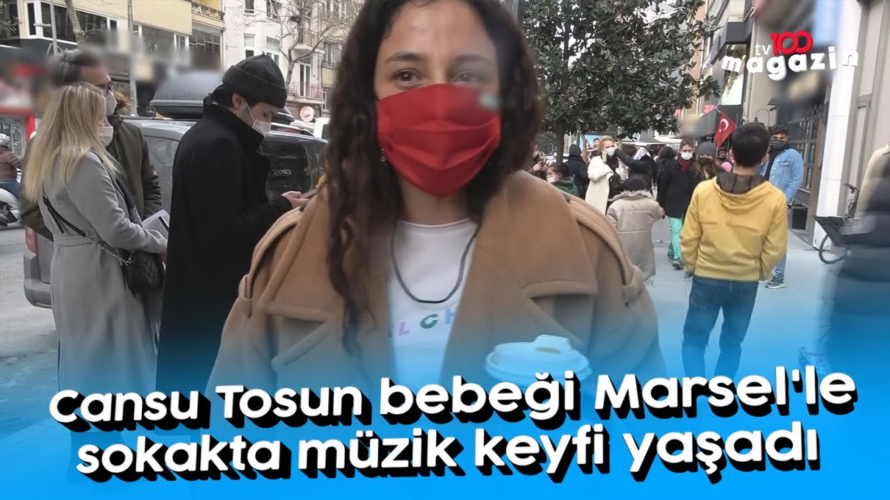 Cansu Tosun bebeği Marsel'le sokakta m&uuml;zik keyfi yaşadı
