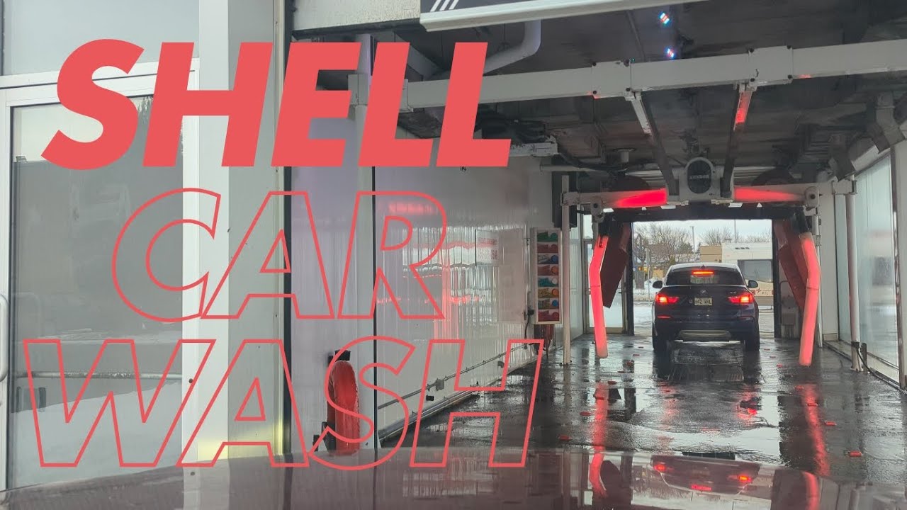 Driving in Shell's carwash on boul Rome, Quebec, Canada on a winter day of January 2026
