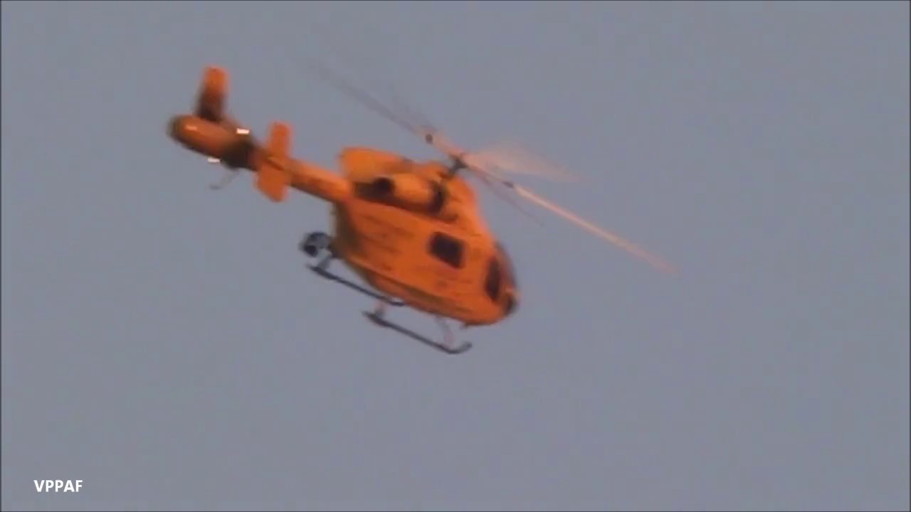 air ambulance flying overhead to land