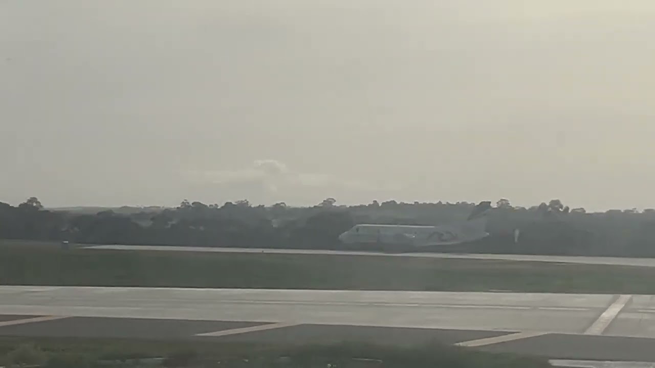 Rex Saab 340 departing Melbourne airport plane view