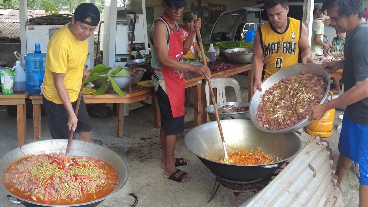 Cooking 2 whole pigs (200kls) for Fiesta and victory party  Celebration