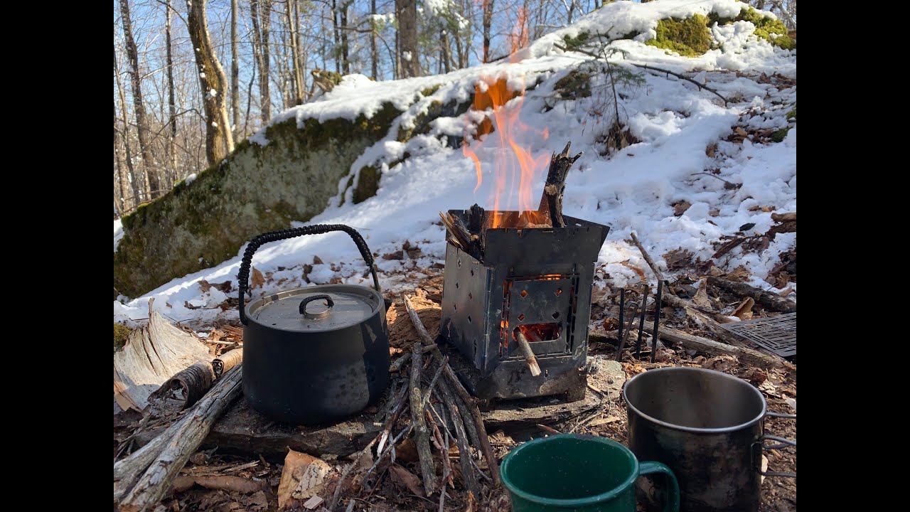 Winter Campfire Cooking Pancakes & Maple Syrup on Firebox in “Sugar Snow”