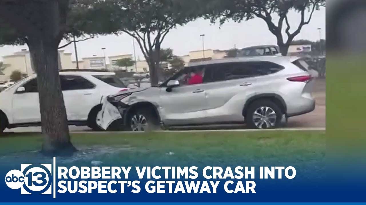 Shocking video shows moment robbery victims ram down suspect getaway car
