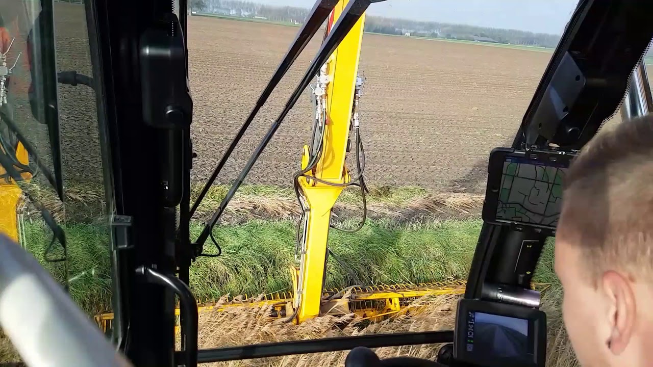 Liebherr A914 met Herder maaikorf