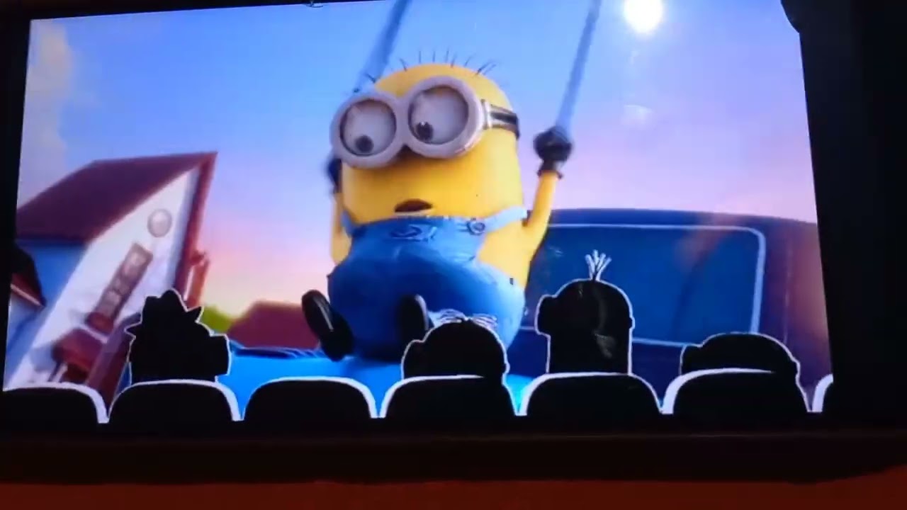 Minions watching despicable me 2 trailer created by brain the minion