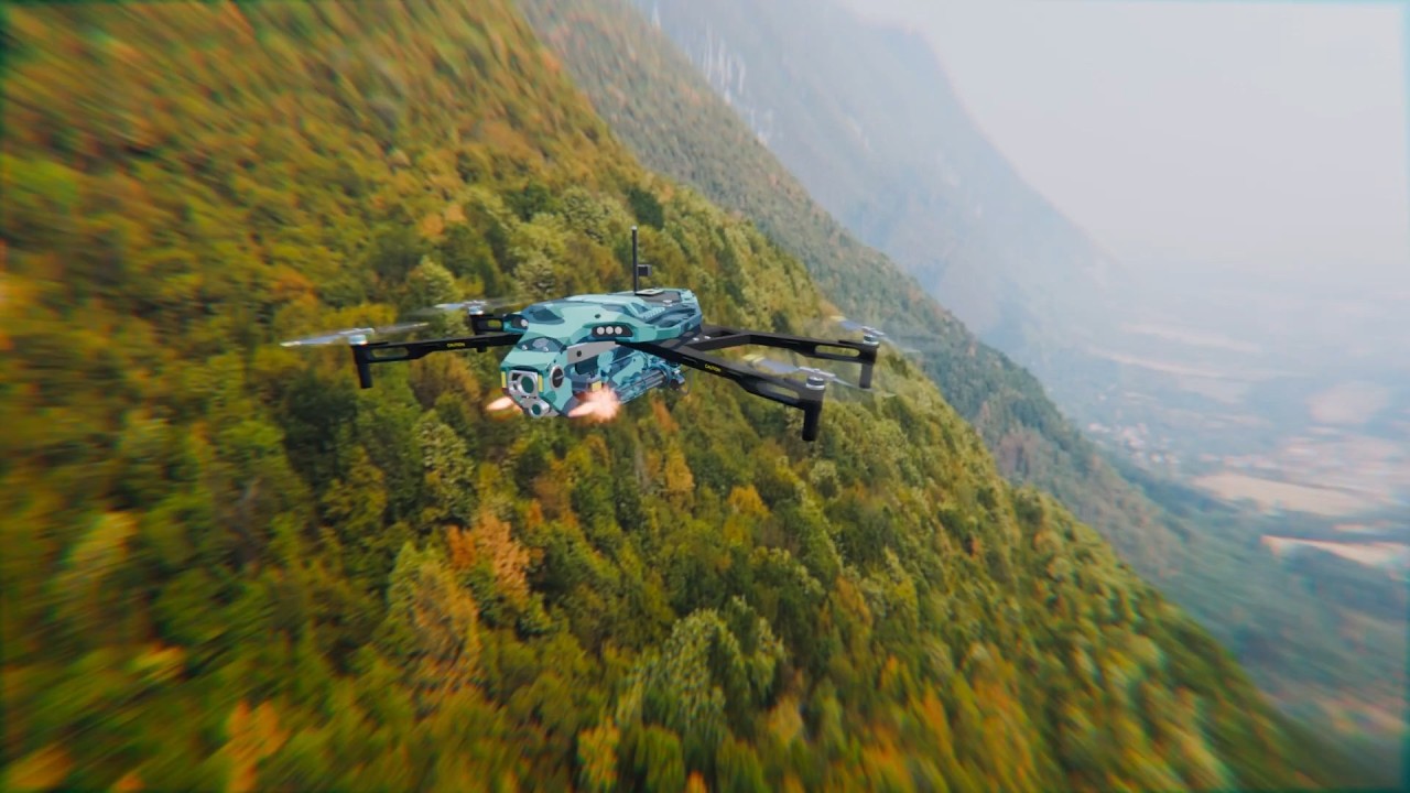 Military Drone - Machine Gun Firing - Flying over hills