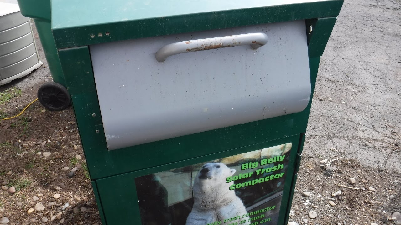 Big Belly Trash Compactor In Action