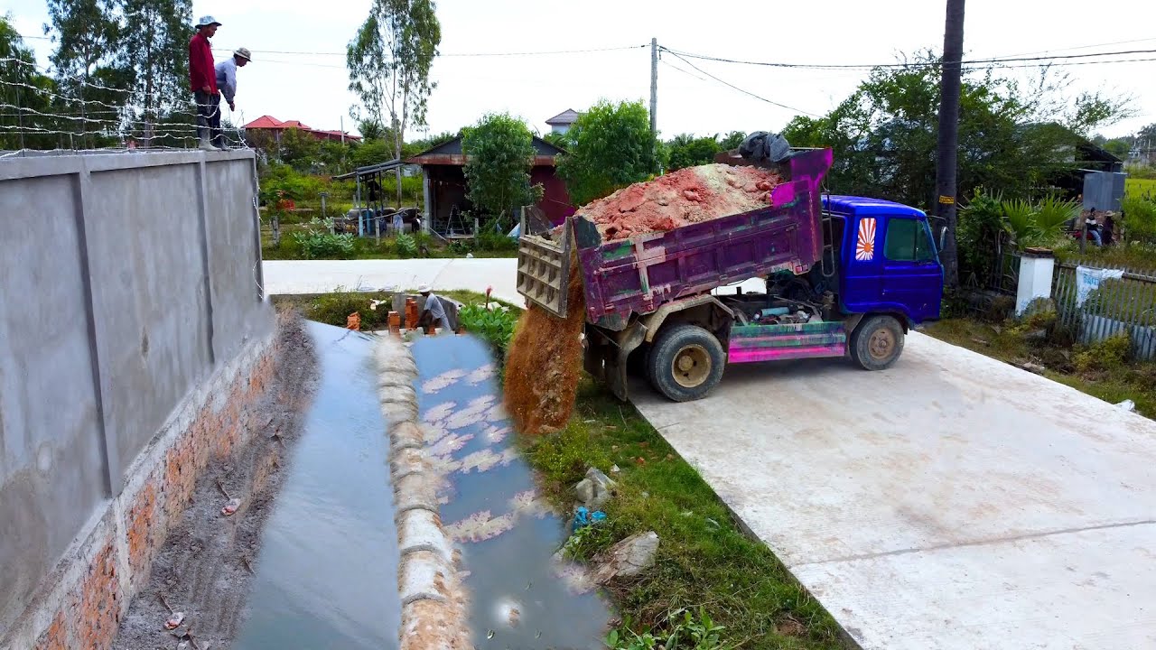 Bulldozer Cover Longer Draining Around The Wall