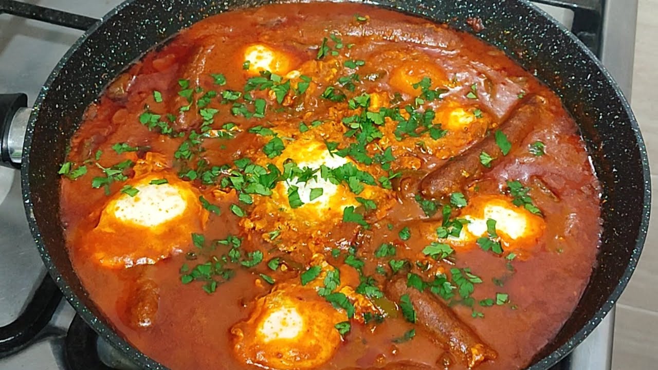 عجة تونسية بالمرقاز على اصولها مع كل اسرار بنتها ojja merguez