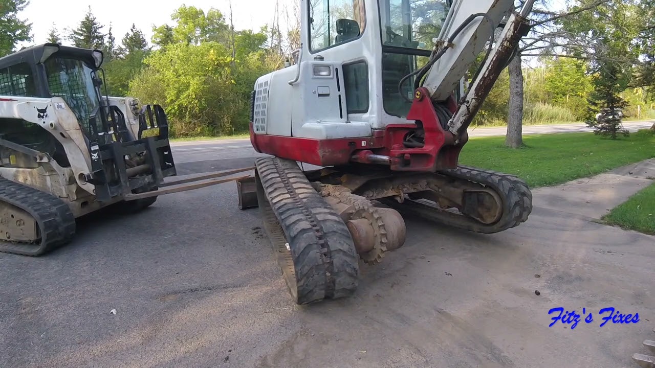 Takeuchi TB135 track change