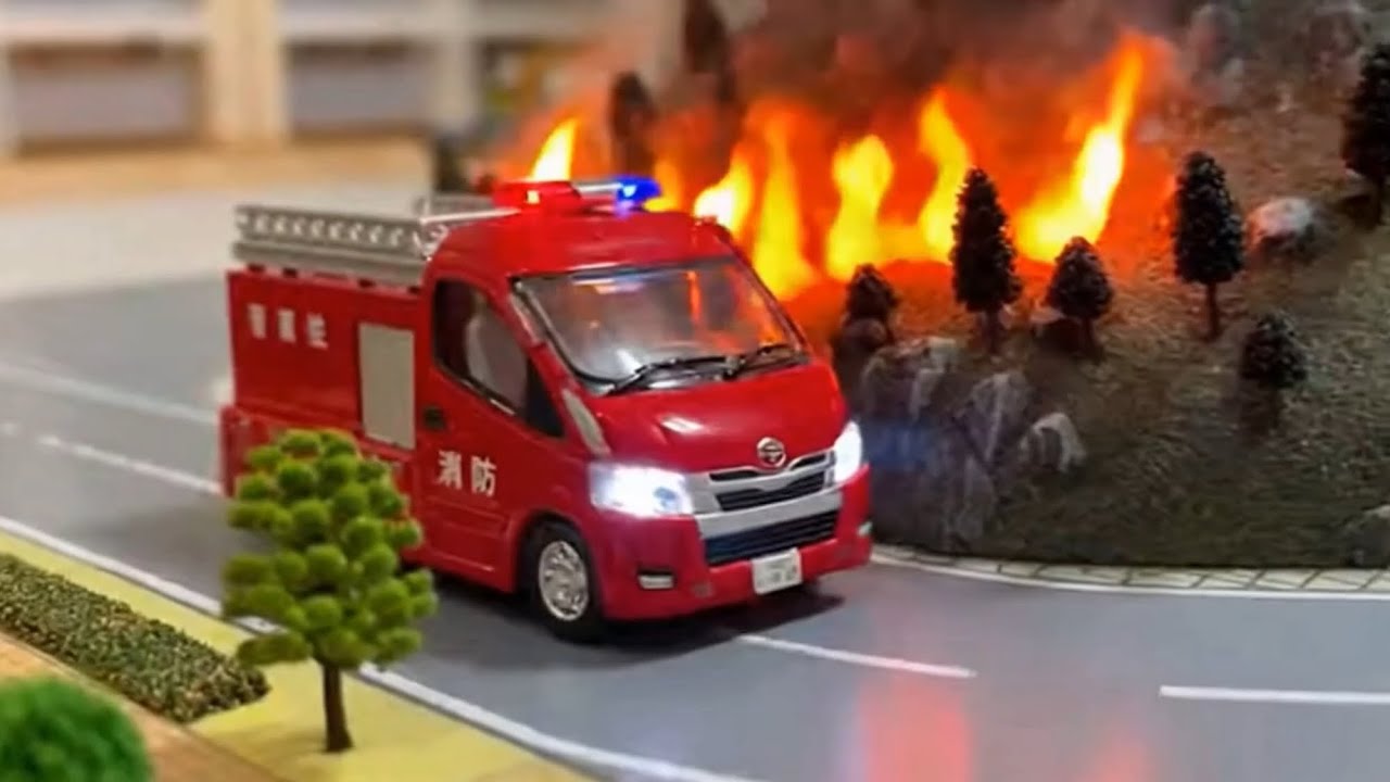 Fire engine running through a toy town for kids