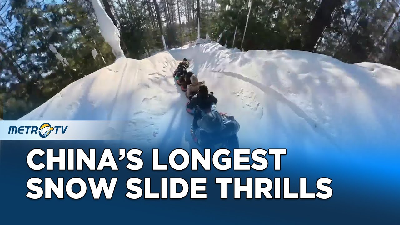 Epic 2000m Snow Slide Draws Thrill Seekers in China