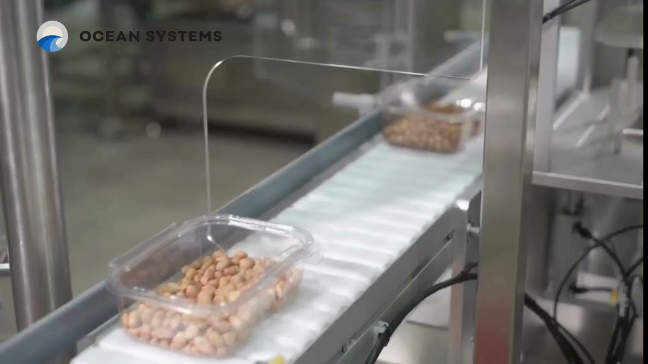 Napełniarka kubków typu „clamshell” – pakowanie orzechów