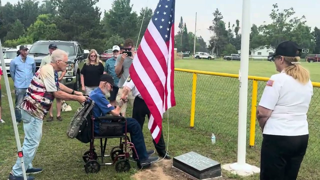Flag pole dedication at the baseball field to honor Lawrence R. “Gator” Howard.