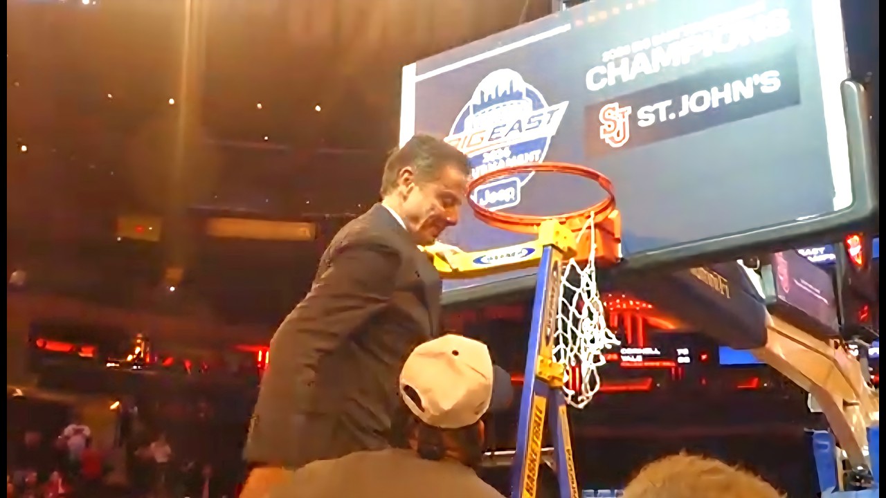 Rick Pitino and Zuby Ejiofor cut down nets after winning Big East