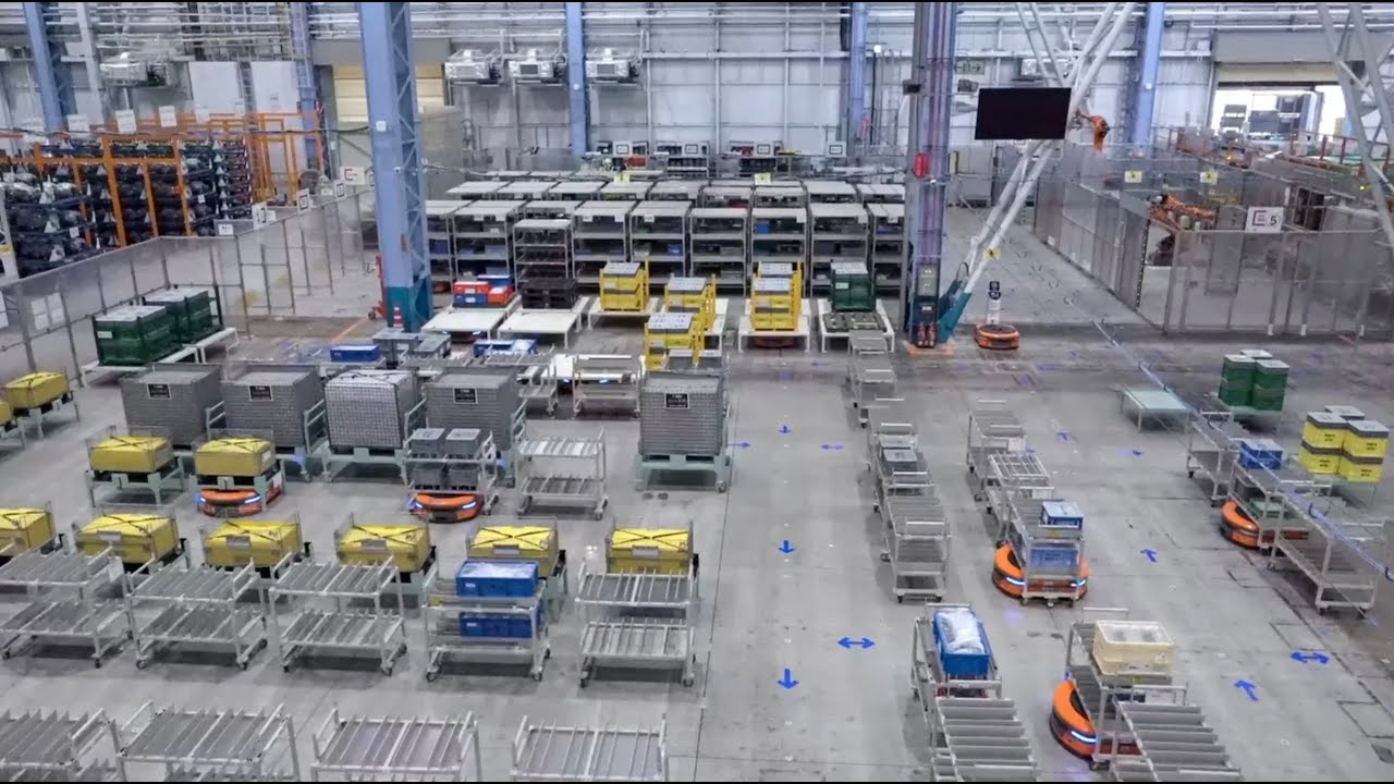 Mujin導入事例「株式会社アイシン様」通い箱ハンドリング知能ロボット & AGVで工場内物流革命を実現
