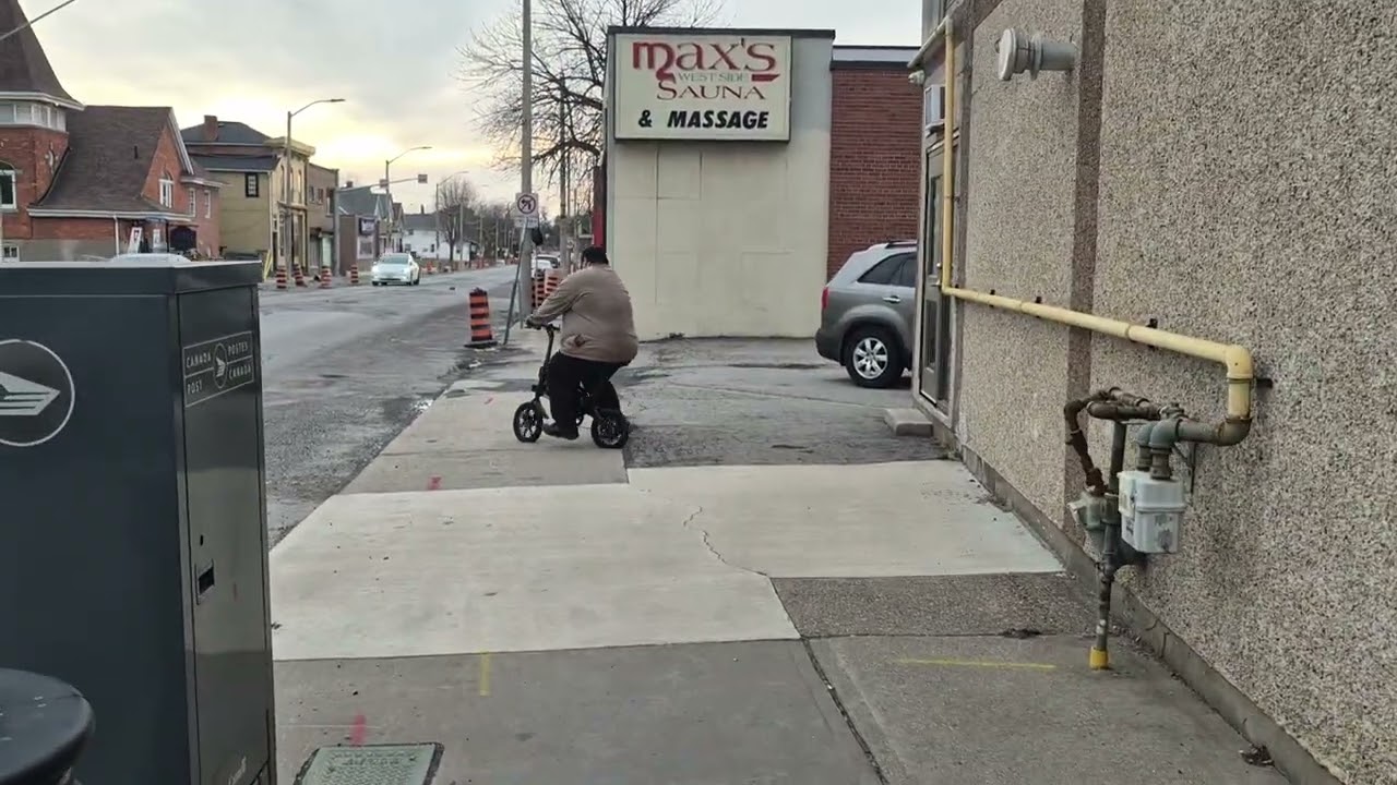 Chris trys  the electric scooter