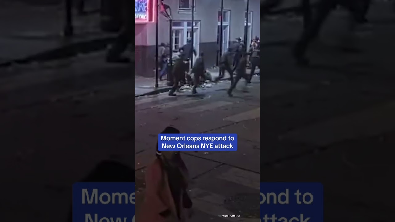 Moment group of cops in New Orleans react to the car driving into Bourbon Street crowd