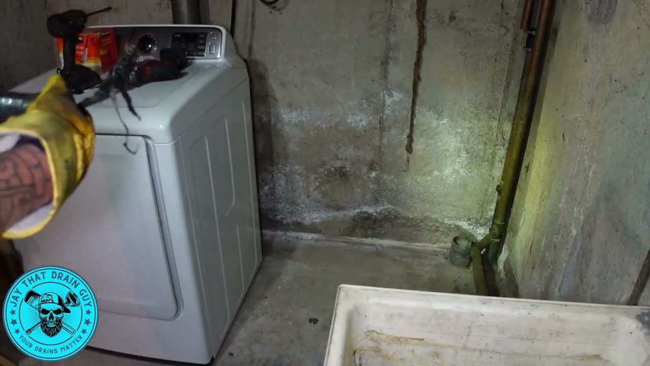 Snaking Out A Clogged Laundry Sink Drain