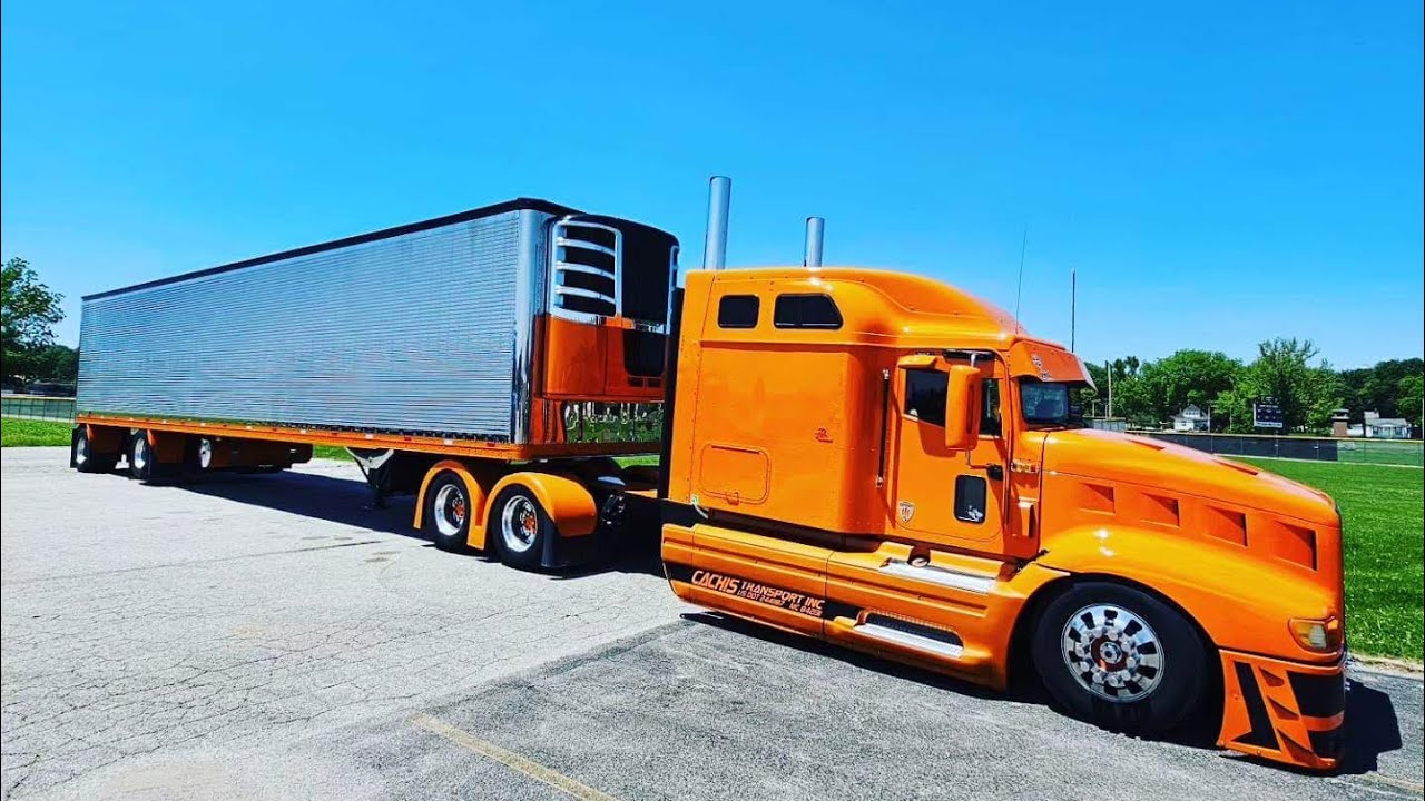 International 9400 matching color ( stainless steel spread axle reefer trailer  )