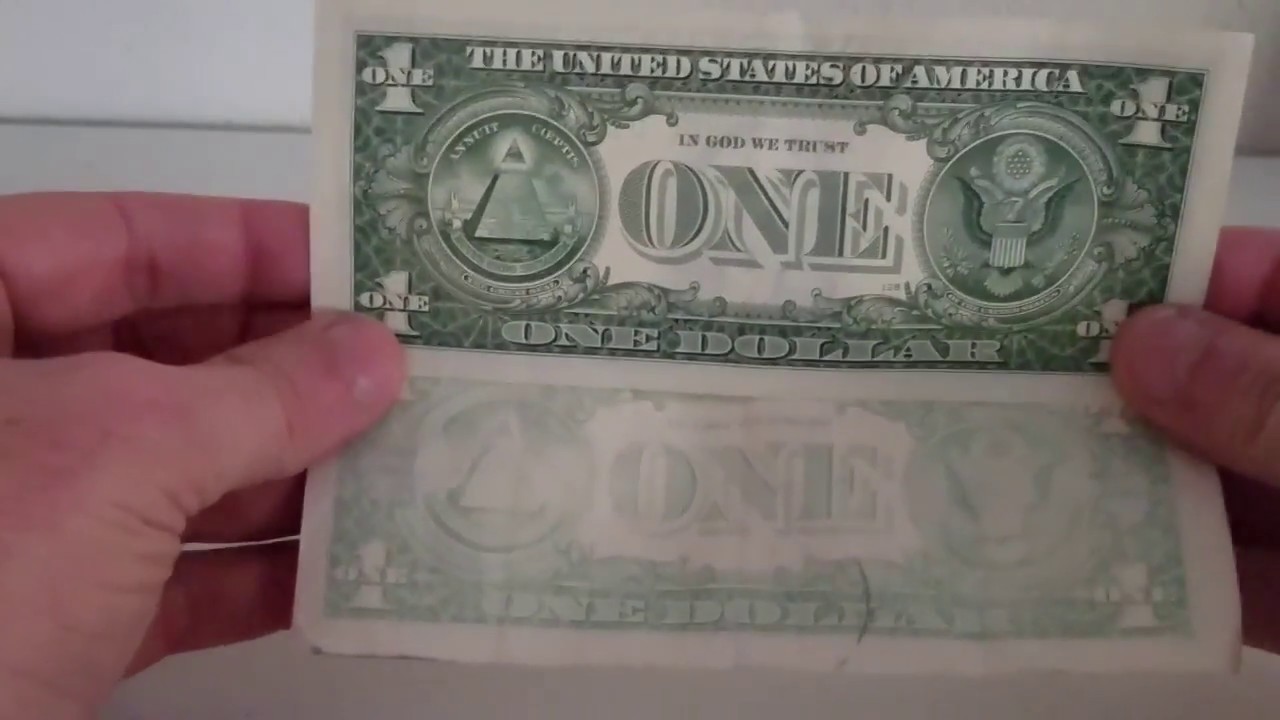 Science experiment taking the ink off money