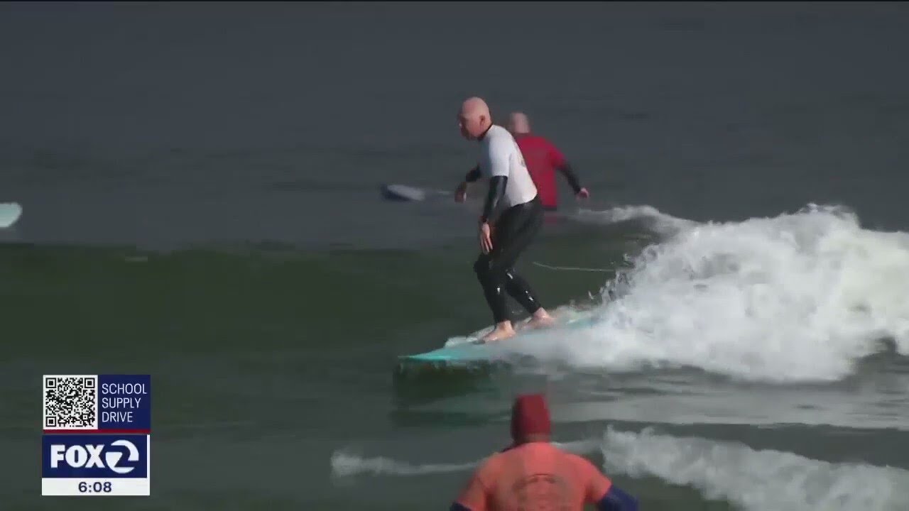 &lsquo;The competition is pretty high&rsquo;: Surfers 40 and older showcase their skills at Linda Mar Beach