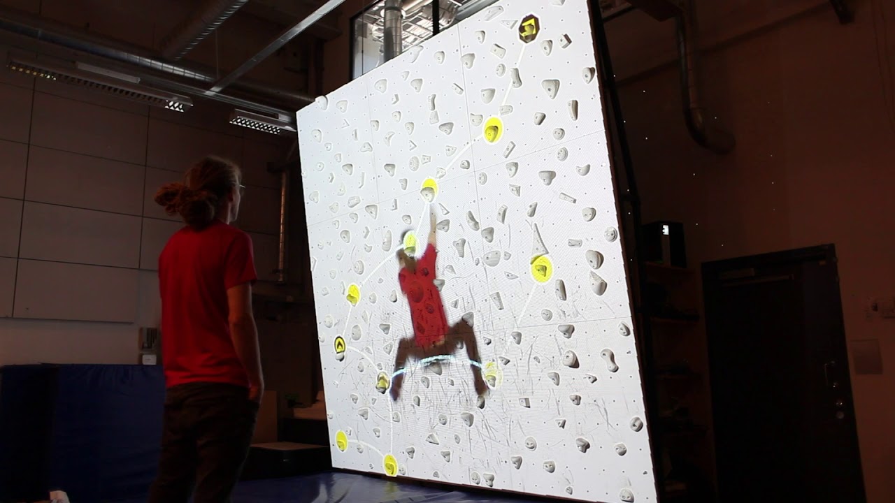 Augmented Climbing Wall - Augmented problems and life size video