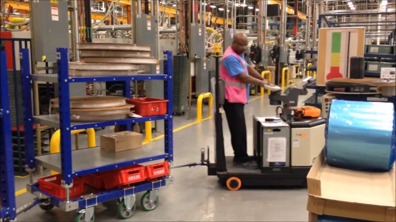 FlexQube® tugger train shelf carts and Crown Tugger