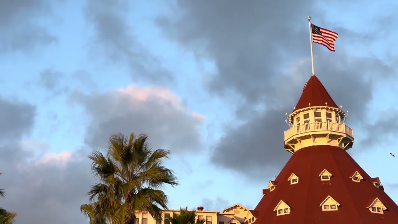 Coastal Vista: Red Roof Tower, Palm Trees, Adventure