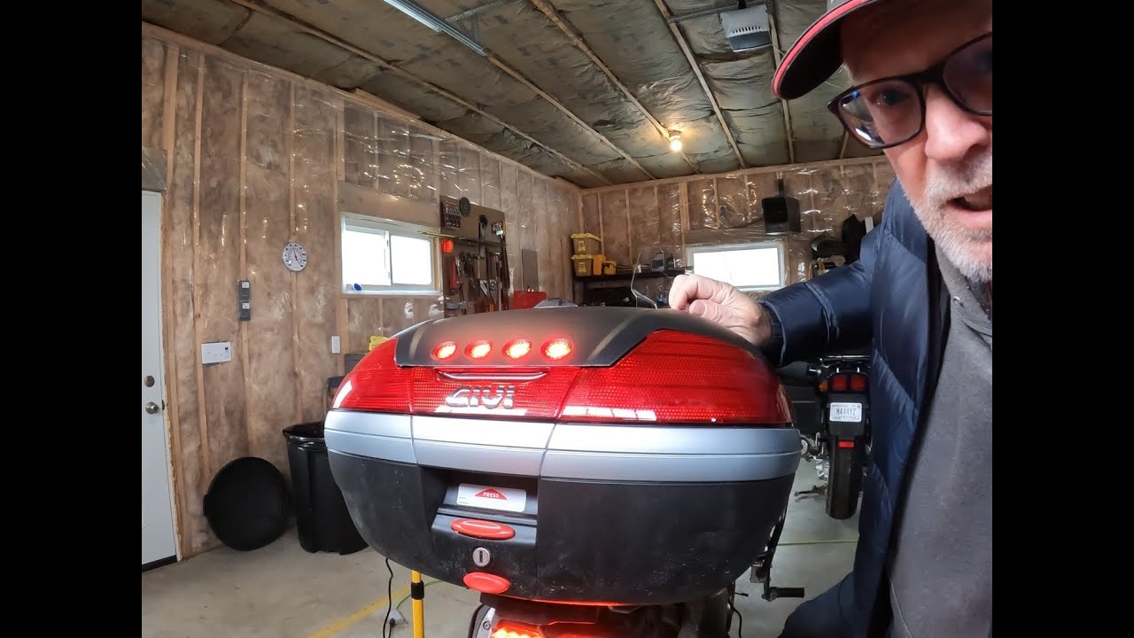 Installing Givi top case brake light kit.