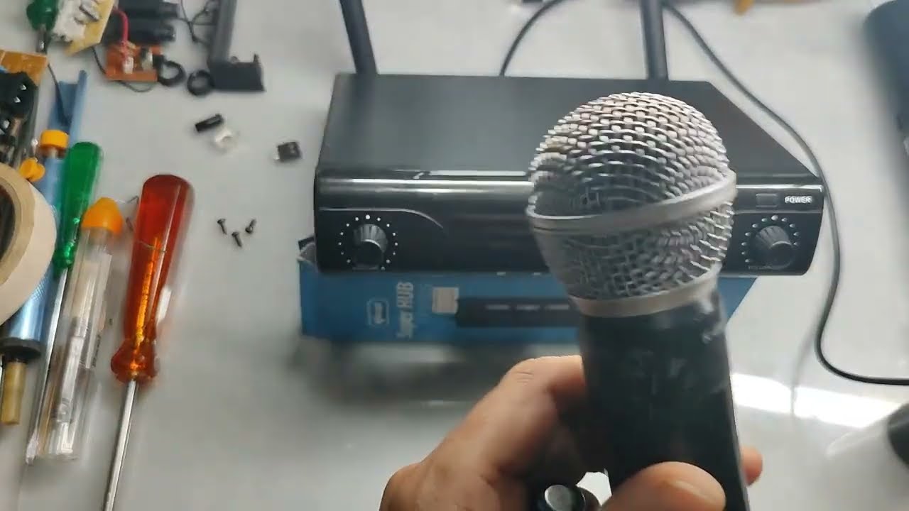 Conserto de base do microfone sem fio da kadoch